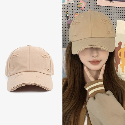 Ny vår- och sommarhatt för män och kvinnor i hiphop-stil, mångsidig, mjuk topp, böjd skärm, retrostil, sliten look med hål och duckbill-form