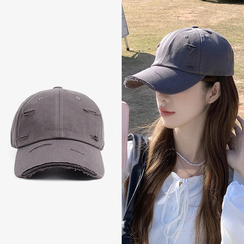 Ny vår- och sommarhatt för män och kvinnor i hiphop-stil, mångsidig, mjuk topp, böjd skärm, retrostil, sliten look med hål och duckbill-form